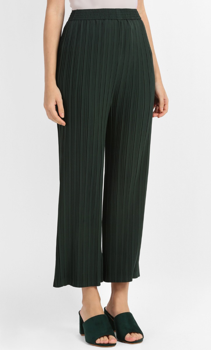 green pleated pants